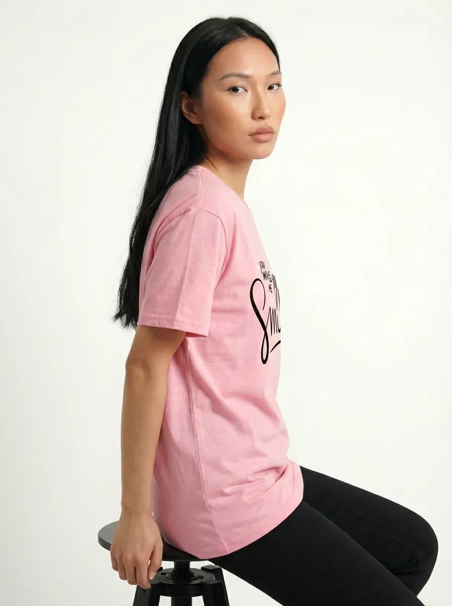 AI model wearing pink graphic t-shirt after conversion